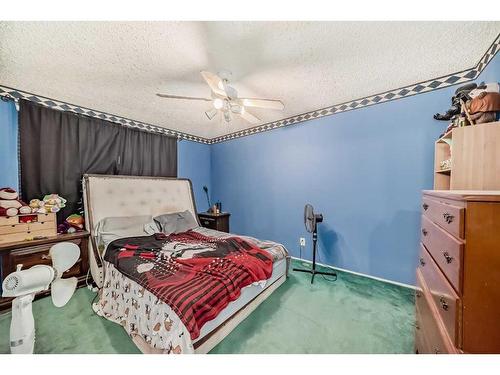 341-405 64 Avenue Ne, Calgary, AB - Indoor Photo Showing Bedroom