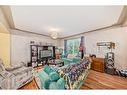 341-405 64 Avenue Ne, Calgary, AB  - Indoor Photo Showing Living Room 