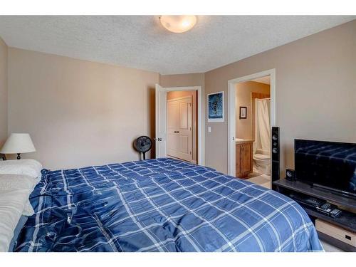 120-413 River Avenue, Cochrane, AB - Indoor Photo Showing Bedroom