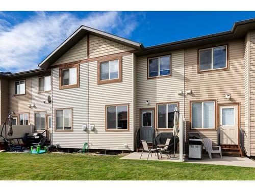 120-413 River Avenue, Cochrane, AB - Outdoor With Exterior