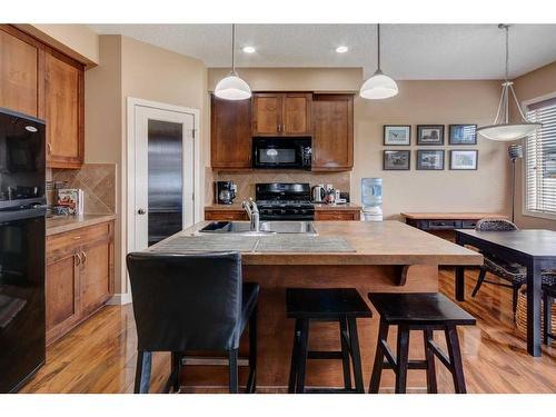 120-413 River Avenue, Cochrane, AB - Indoor Photo Showing Kitchen