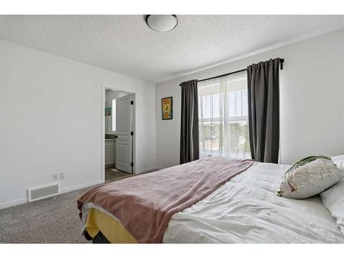 867 Mahogany Boulevard Se, Calgary, AB - Indoor Photo Showing Bedroom