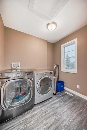 63 Chapalina Crescent Se, Calgary, AB - Indoor Photo Showing Bedroom