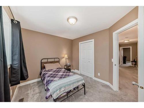 63 Chapalina Crescent Se, Calgary, AB - Indoor Photo Showing Bedroom