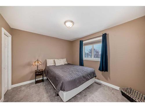 63 Chapalina Crescent Se, Calgary, AB - Indoor Photo Showing Bedroom