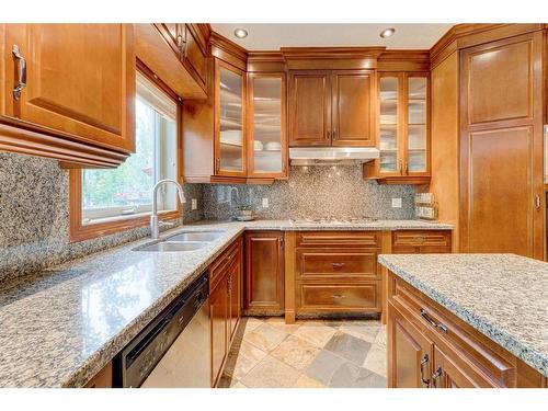 76 Coulee View Sw, Calgary, AB - Indoor Photo Showing Kitchen With Double Sink