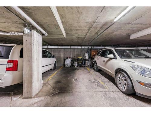 111-550 Prominence Rise Sw, Calgary, AB - Indoor Photo Showing Garage