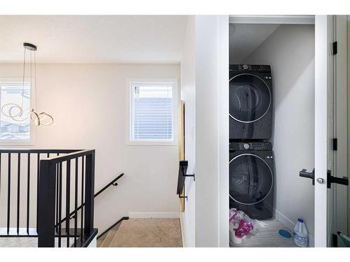 68 Midtown Close Sw, Airdrie, AB - Indoor Photo Showing Laundry Room