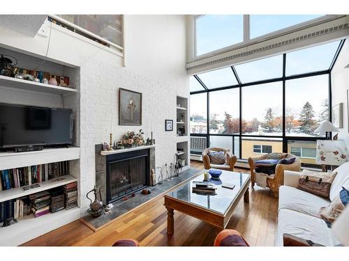 405-1732 9A Street Sw, Calgary, AB - Indoor Photo Showing Living Room With Fireplace