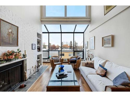 405-1732 9A Street Sw, Calgary, AB - Indoor Photo Showing Living Room With Fireplace