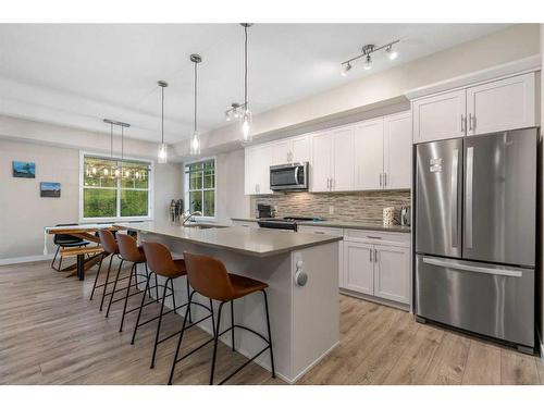 732 Cranbrook Walk Se, Calgary, AB - Indoor Photo Showing Kitchen With Upgraded Kitchen