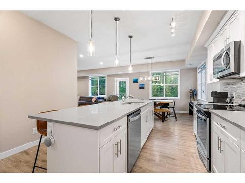 732 Cranbrook Walk Se, Calgary, AB - Indoor Photo Showing Kitchen With Upgraded Kitchen