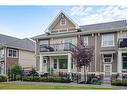 732 Cranbrook Walk Se, Calgary, AB  - Outdoor With Balcony With Facade 