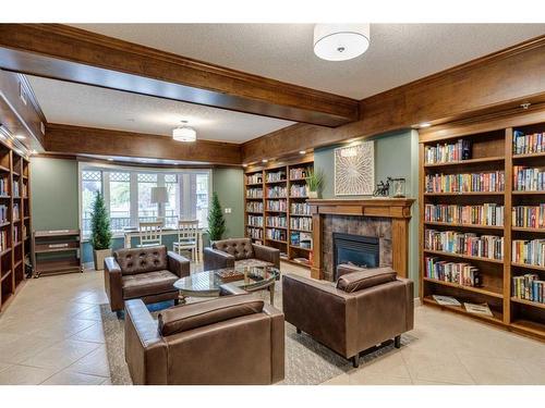 1117-48 Inverness Gate Se, Calgary, AB - Indoor With Fireplace