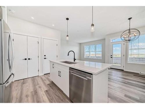 72 Magnolia Bay Se, Calgary, AB - Indoor Photo Showing Kitchen With Upgraded Kitchen