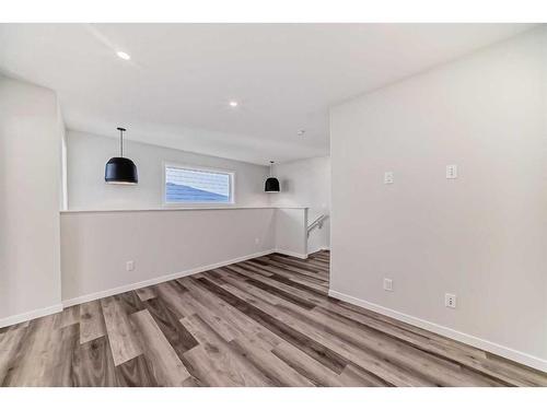 72 Magnolia Bay Se, Calgary, AB - Indoor Photo Showing Other Room