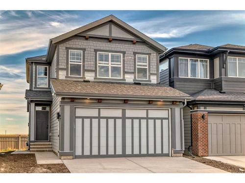 72 Magnolia Bay Se, Calgary, AB - Outdoor With Facade