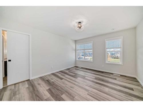 72 Magnolia Bay Se, Calgary, AB - Indoor Photo Showing Other Room