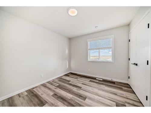 72 Magnolia Bay Se, Calgary, AB - Indoor Photo Showing Other Room