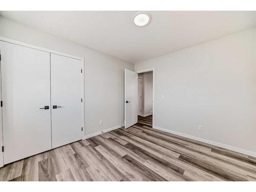 72 Magnolia Bay Se, Calgary, AB - Indoor Photo Showing Other Room