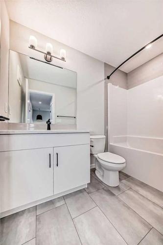 72 Magnolia Bay Se, Calgary, AB - Indoor Photo Showing Bathroom