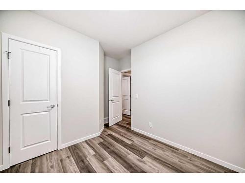 72 Magnolia Bay Se, Calgary, AB - Indoor Photo Showing Other Room