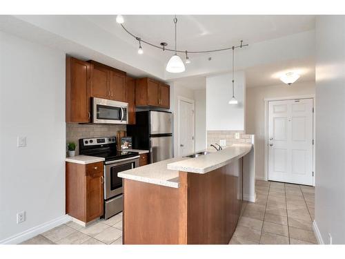 3316-24 Hemlock Crescent Sw, Calgary, AB - Indoor Photo Showing Kitchen With Stainless Steel Kitchen With Double Sink