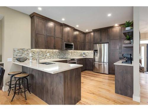 139 West Terrace Point, Cochrane, AB - Indoor Photo Showing Kitchen With Stainless Steel Kitchen With Upgraded Kitchen