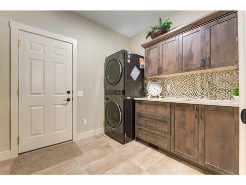 139 West Terrace Point, Cochrane, AB - Indoor Photo Showing Laundry Room