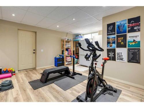 139 West Terrace Point, Cochrane, AB - Indoor Photo Showing Gym Room