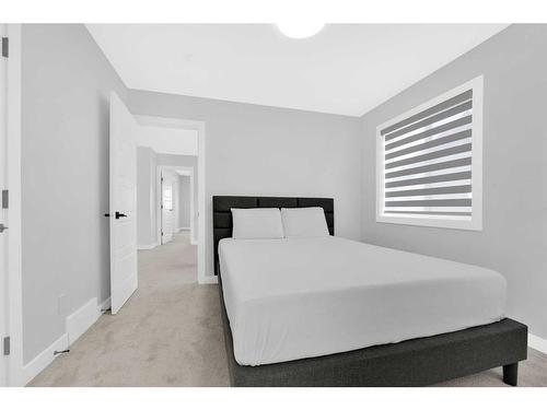 114 Waterford Road, Chestermere, AB - Indoor Photo Showing Bedroom