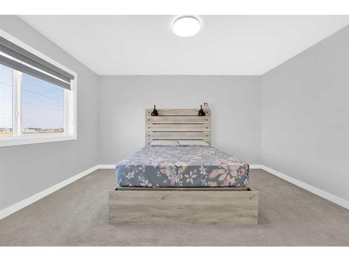 114 Waterford Road, Chestermere, AB - Indoor Photo Showing Bedroom