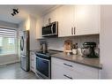 82 Auburn Meadows View Se, Calgary, AB  - Indoor Photo Showing Kitchen 