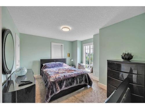 177 Stonemere Close, Chestermere, AB - Indoor Photo Showing Bedroom