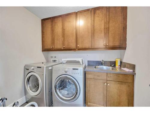 177 Stonemere Close, Chestermere, AB - Indoor Photo Showing Laundry Room