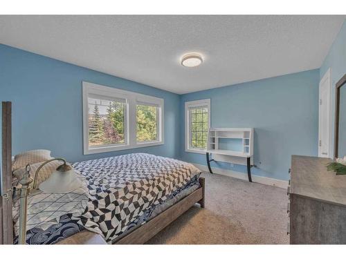 177 Stonemere Close, Chestermere, AB - Indoor Photo Showing Bedroom