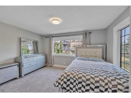 177 Stonemere Close, Chestermere, AB - Indoor Photo Showing Bedroom