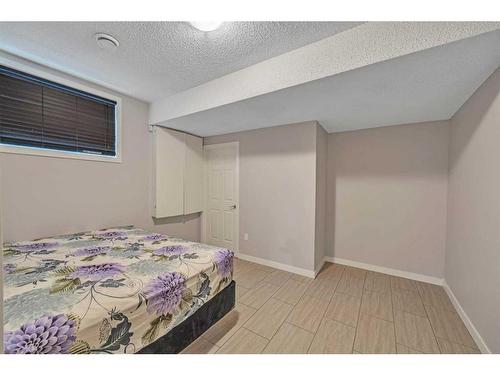 177 Stonemere Close, Chestermere, AB - Indoor Photo Showing Bedroom