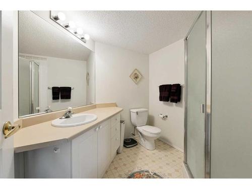 1112-1112 Sienna Park Green Sw, Calgary, AB - Indoor Photo Showing Bathroom