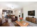 236-20 Seton Park Se, Calgary, AB  - Indoor Photo Showing Living Room 