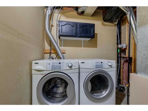 84 Somerset Drive Sw, Calgary, AB - Indoor Photo Showing Laundry Room