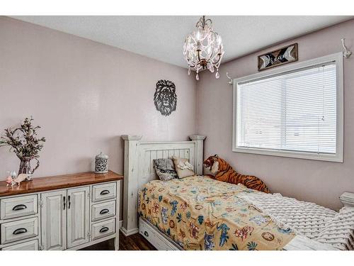 11 Bridlecrest Road Sw, Calgary, AB - Indoor Photo Showing Bedroom