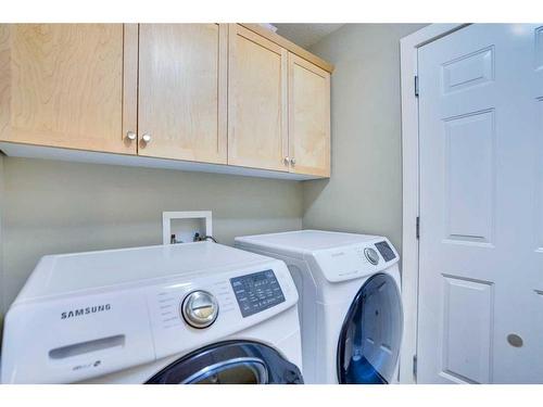 2733 Coopers Circle Sw, Airdrie, AB - Indoor Photo Showing Laundry Room