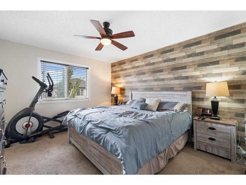 1031 Kings Heights Road, Airdrie, AB - Indoor Photo Showing Bedroom