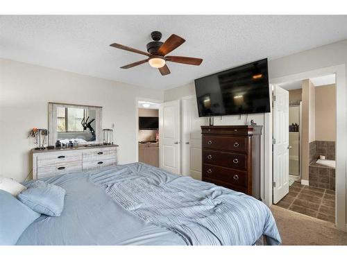 1031 Kings Heights Road, Airdrie, AB - Indoor Photo Showing Bedroom