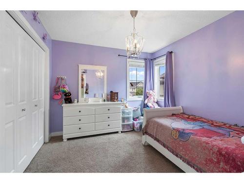 1031 Kings Heights Road, Airdrie, AB - Indoor Photo Showing Bedroom