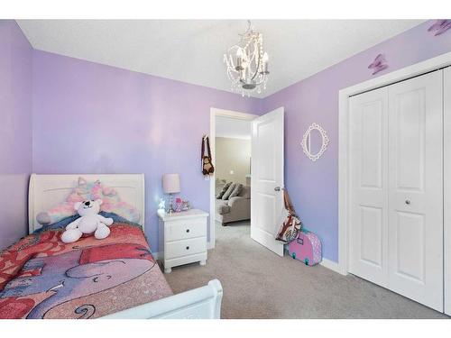 1031 Kings Heights Road, Airdrie, AB - Indoor Photo Showing Bedroom