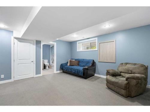 1031 Kings Heights Road, Airdrie, AB - Indoor Photo Showing Bedroom