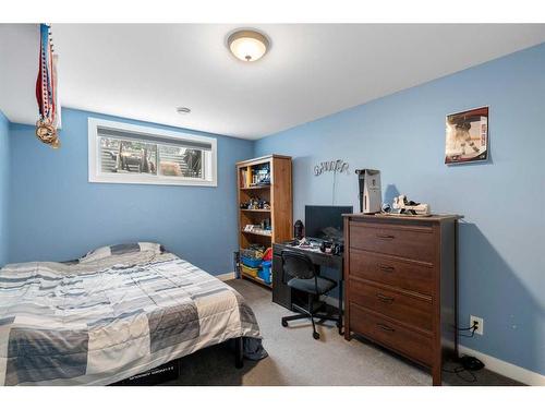 1031 Kings Heights Road, Airdrie, AB - Indoor Photo Showing Bedroom