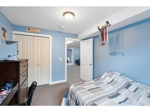 1031 Kings Heights Road, Airdrie, AB - Indoor Photo Showing Bedroom